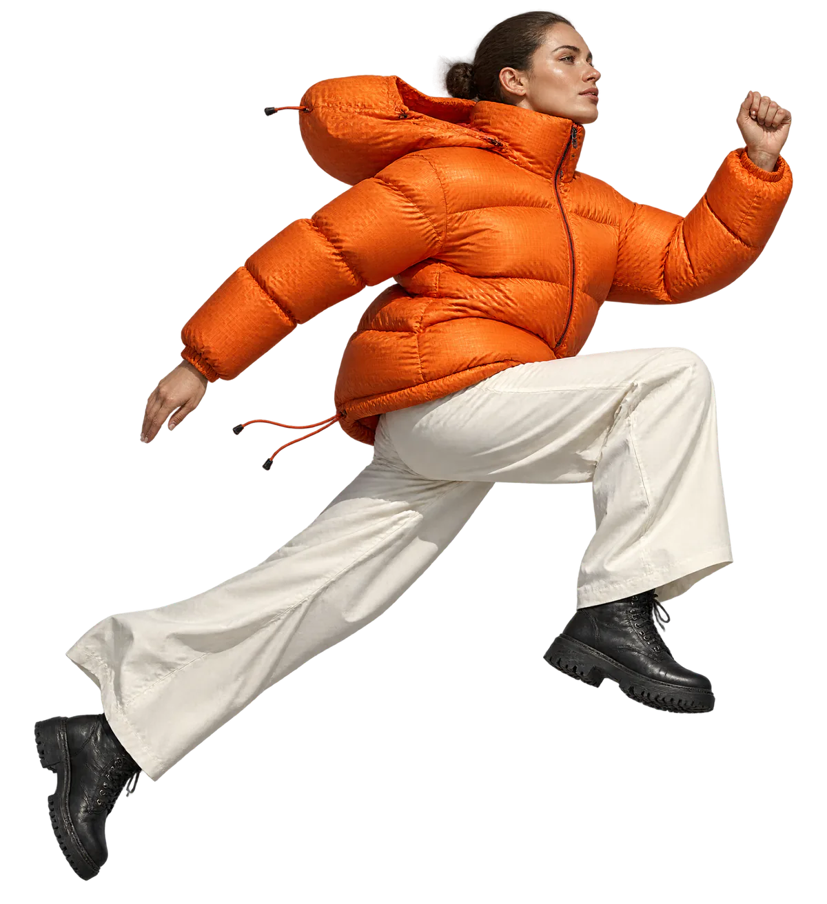 A person in an orange puffer jacket leaping out of the poster frame